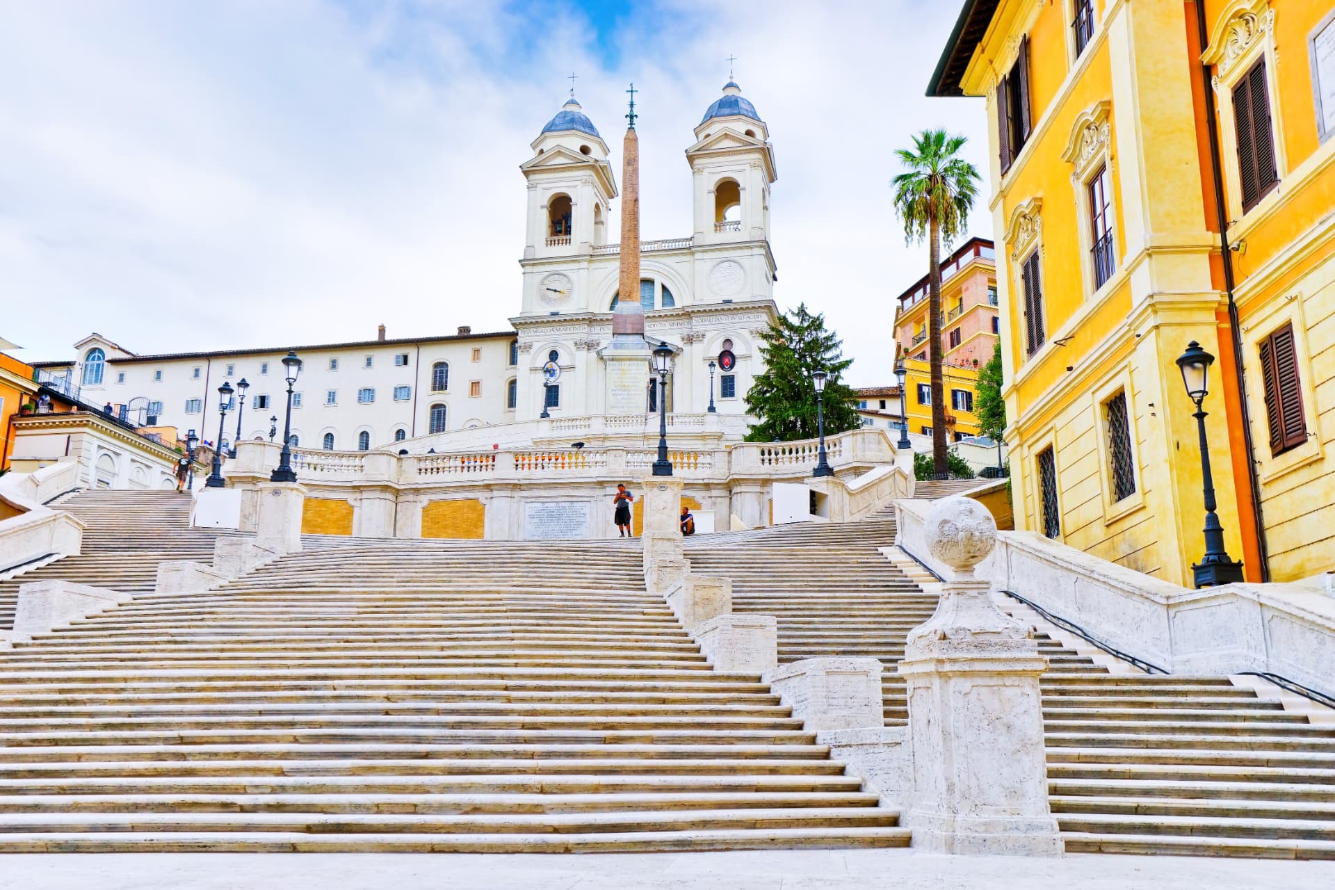 Trinità dei Monti twin towers above a lightly occupied Spanish Steps staircase