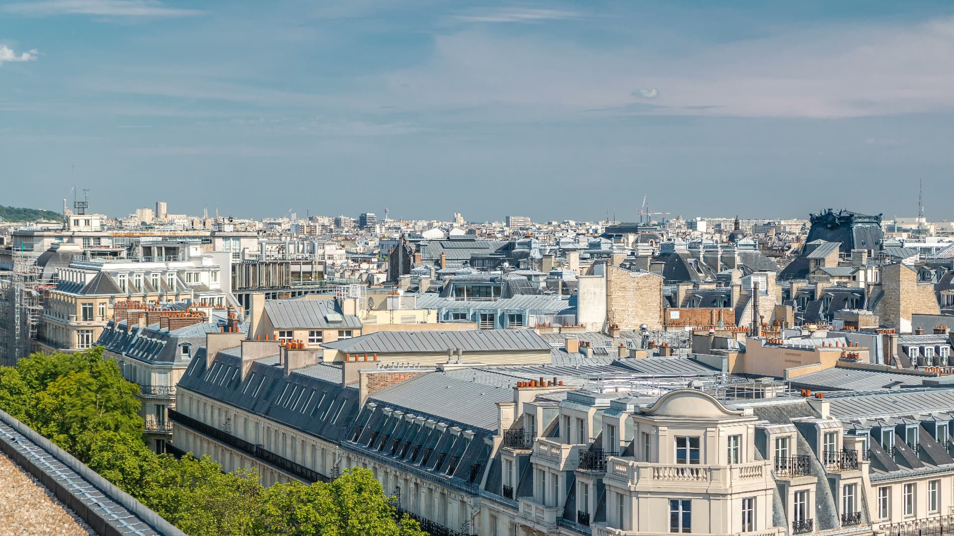 View over the zinc rooftops of Paris from the Galeries Lafayette rooftop terrace