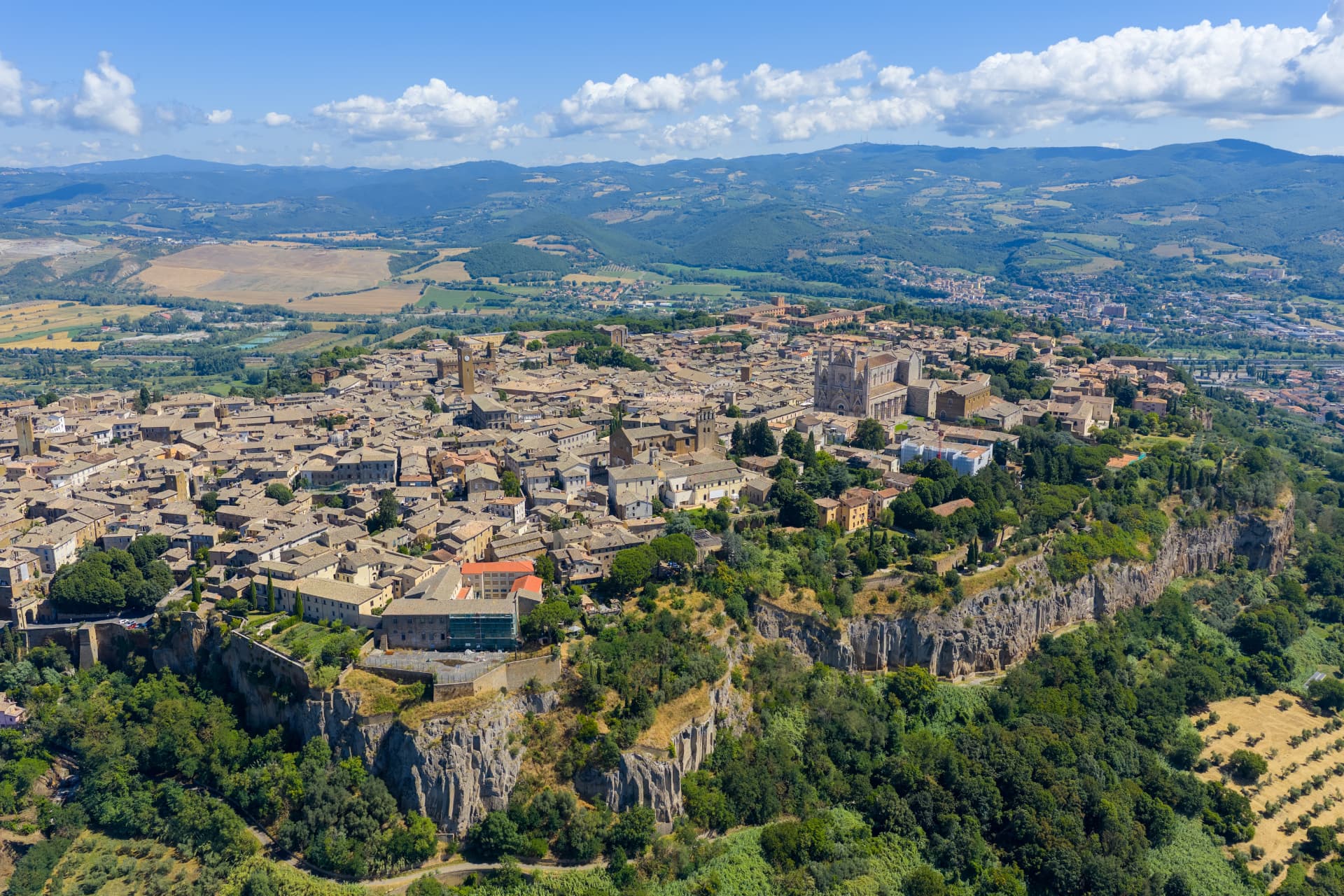 Aerial view of Orvieto on its tufa plateau with the cathedral rising above the rooftops