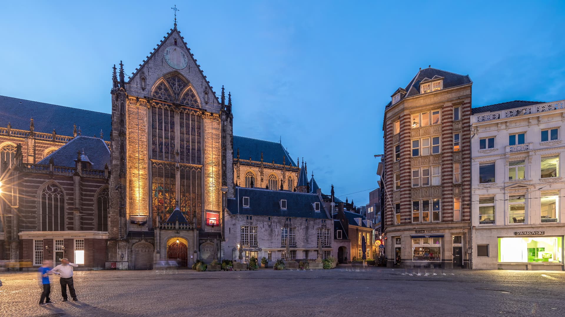 The Nieuwe Kerk on Dam Square in Amsterdam, floodlit at dusk