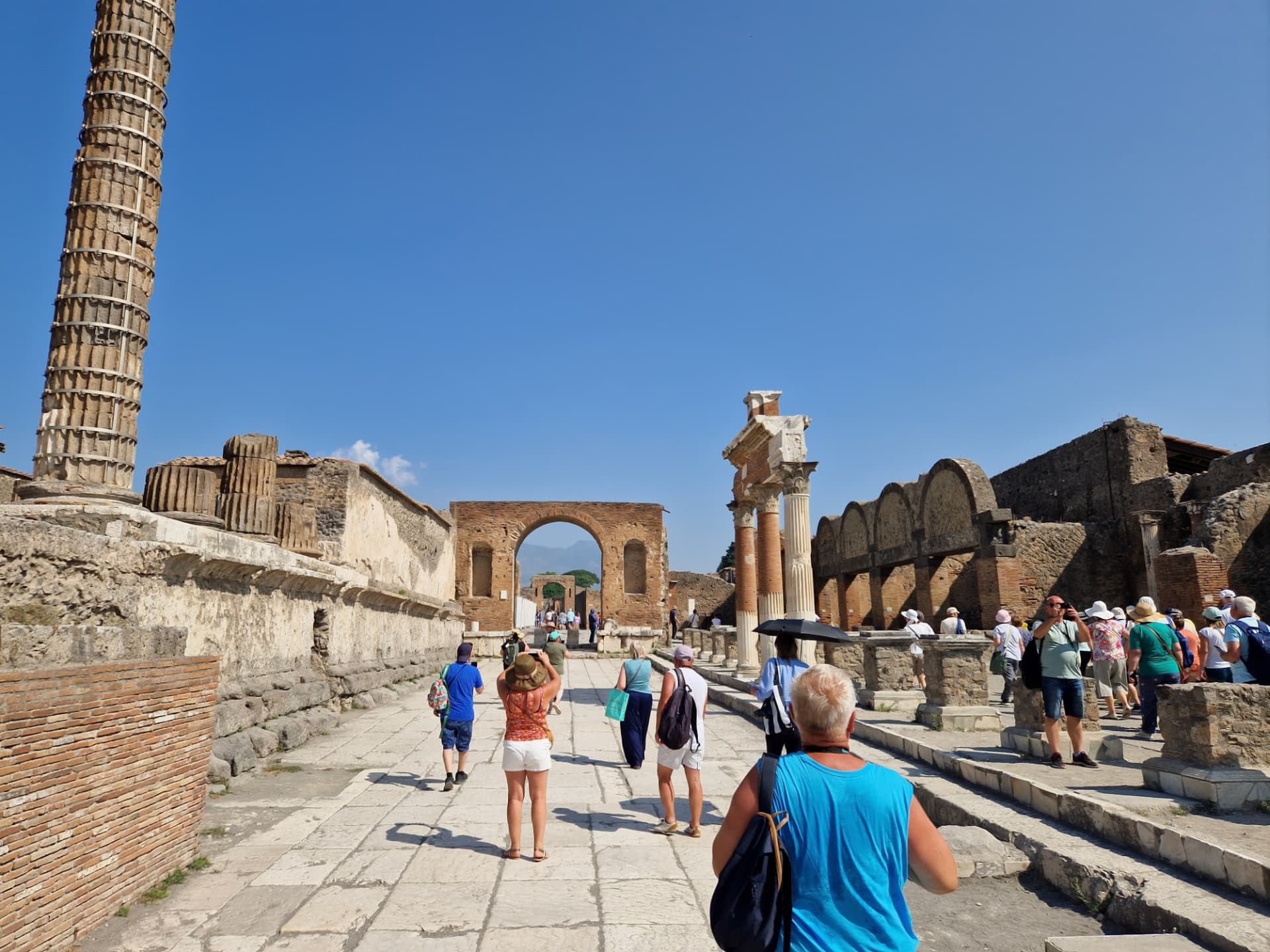 The Forum at Pompeii with Mount Vesuvius behind the ruins