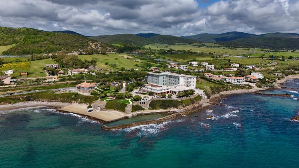 Aerial view of Santa Marinella's rocky coastline, coves and green hills