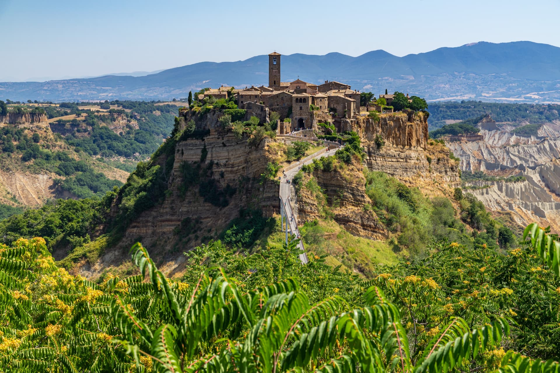 Civita di Bagnoregio and its pedestrian bridge across the eroded valley