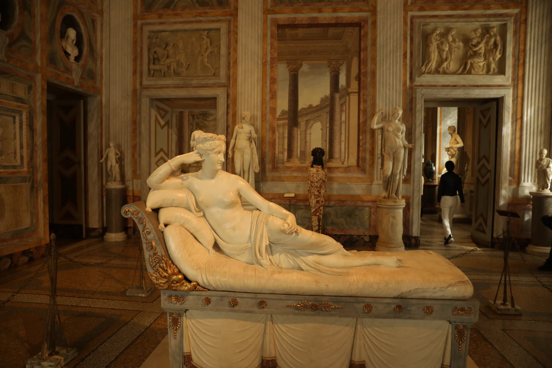 Canova's Pauline Borghese displayed in an ornate Gallery room