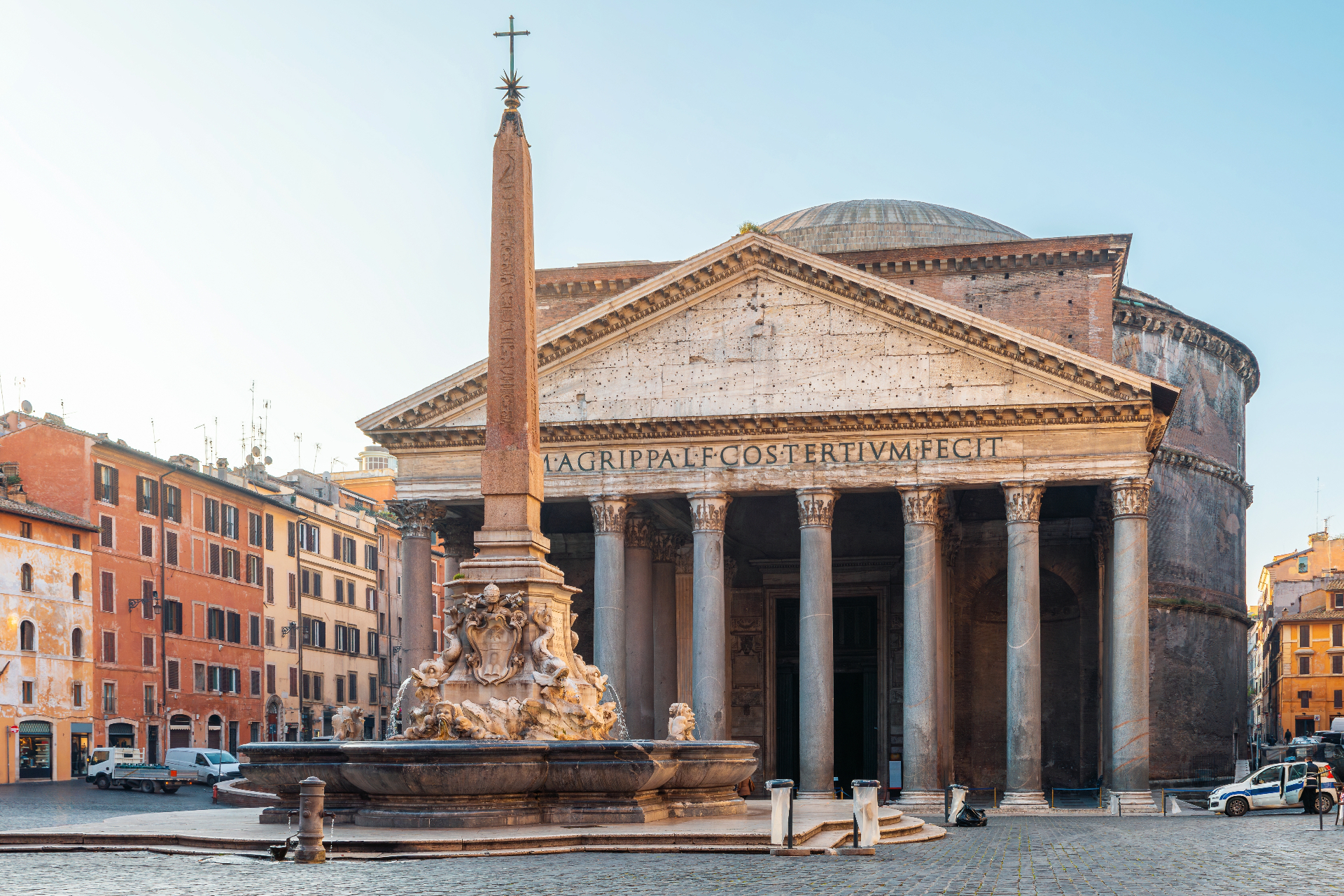 Pantheon Rome front facade with the obelisk fountain in Piazza della Rotonda under soft sunrise light