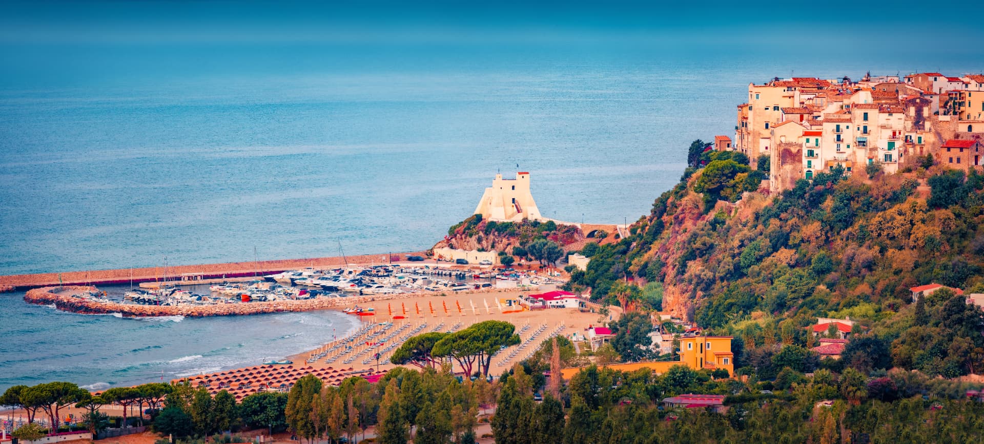 Sperlonga beach, marina and Torre Truglia below the old town