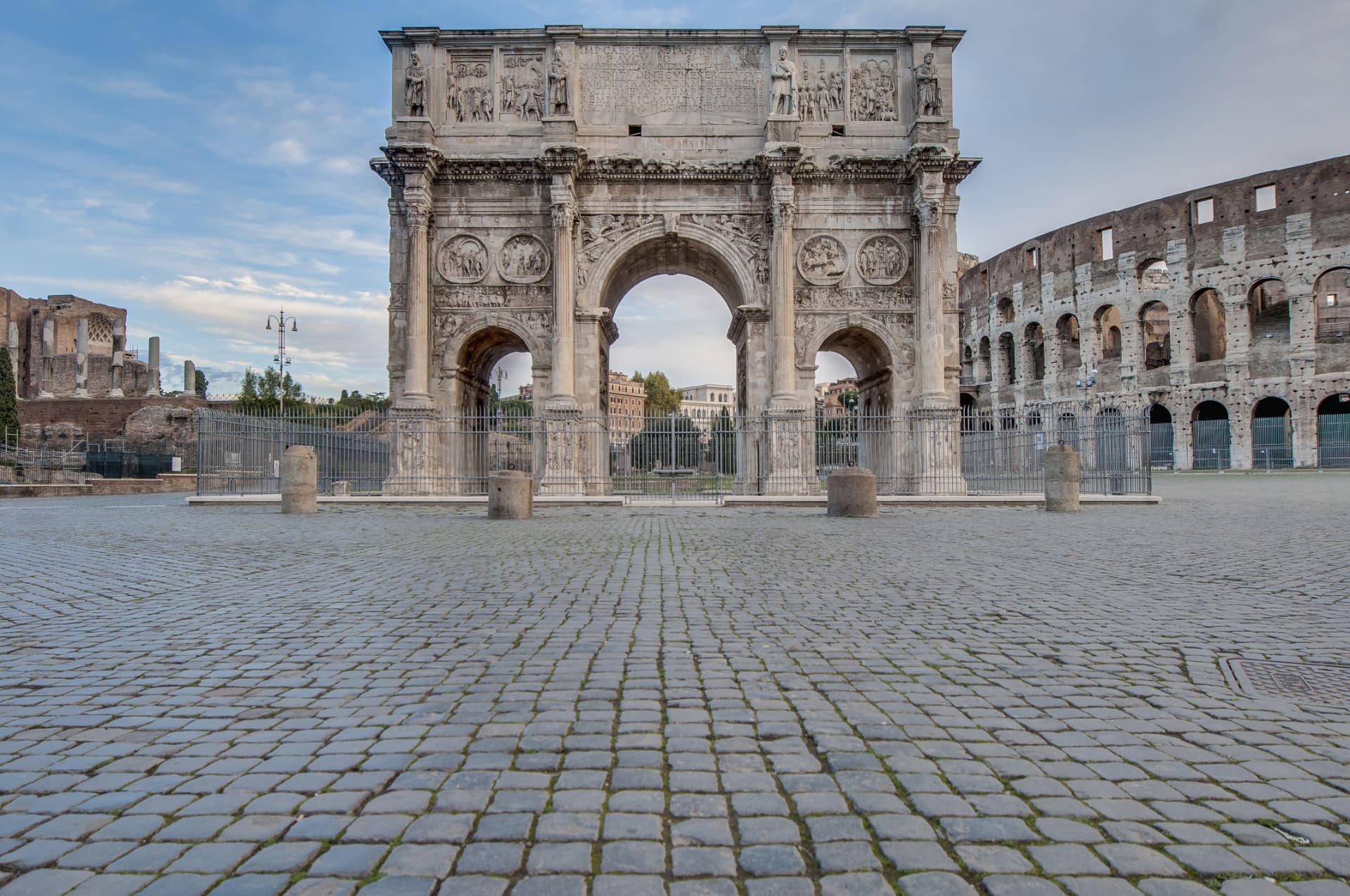 Arch of Constantine with the Colosseum behind it