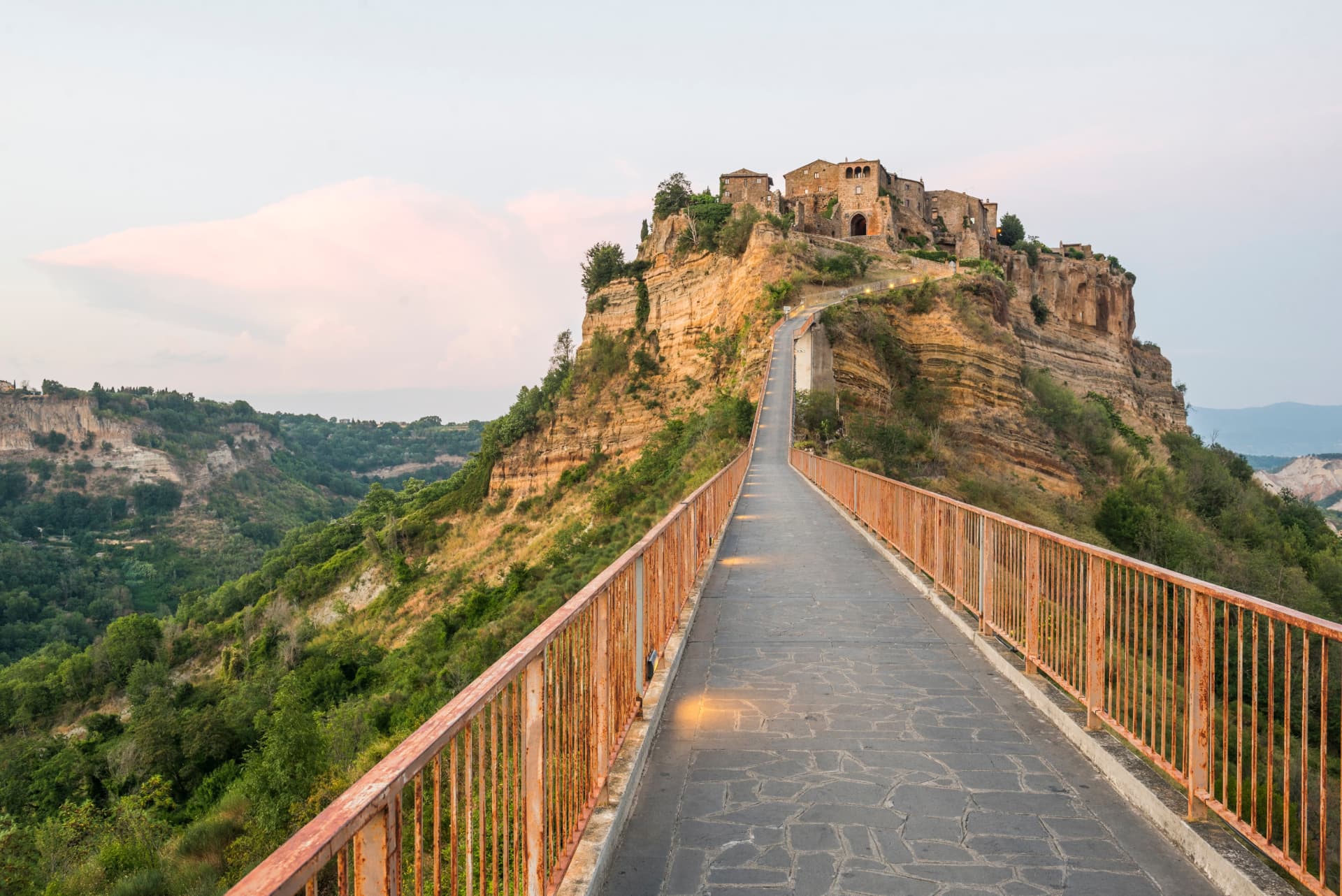 The pedestrian bridge climbing towards Civita di Bagnoregio on its eroding tufa hill