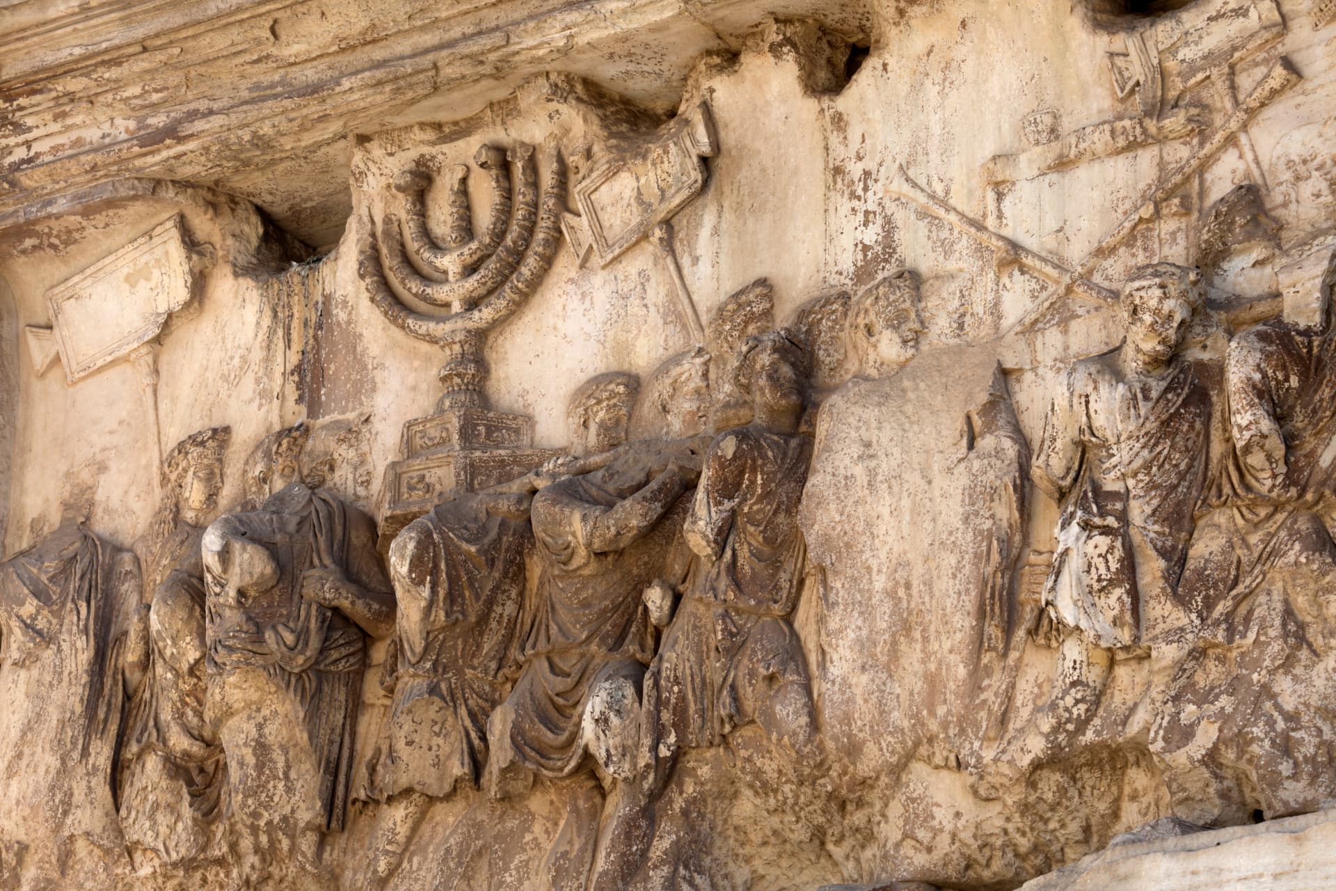 Relief inside the Arch of Titus showing Roman soldiers carrying the Temple menorah