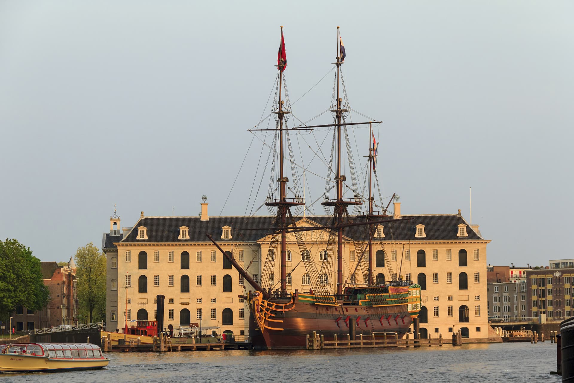 The full-size replica of the Dutch East India ship Amsterdam moored in front of the National Maritime Museum