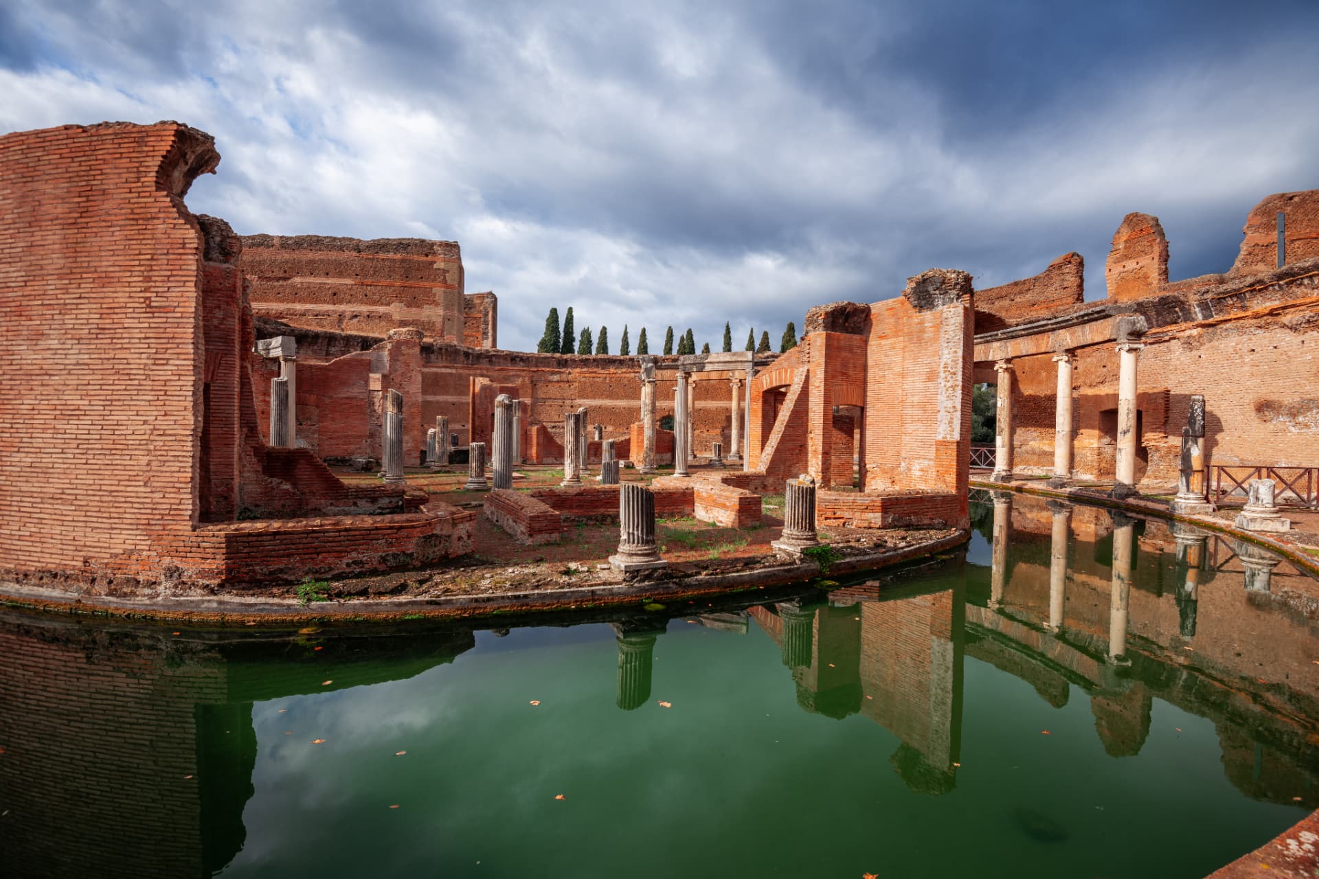 Circular brick colonnade and reflecting water at the Maritime Theatre in Hadrian's Villa