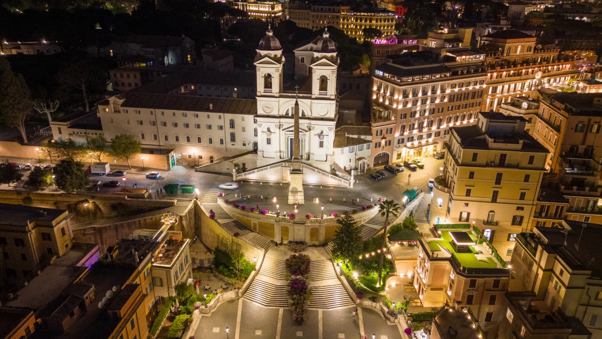 Illuminated Spanish Steps and Trinità dei Monti at night from above