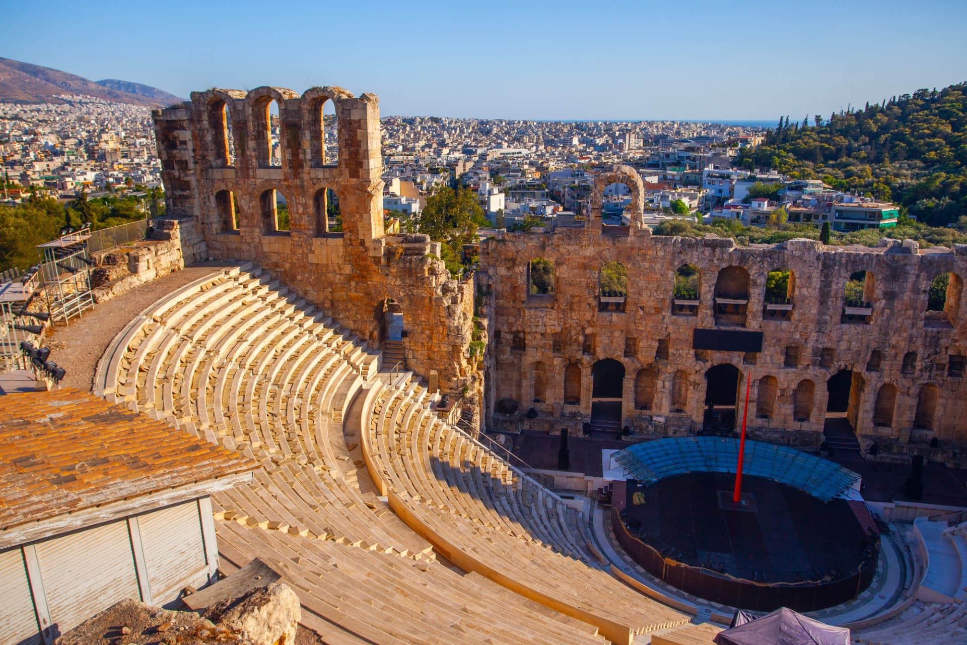 The stone tiers of the Odeon of Herodes Atticus with Athens spreading out behind it