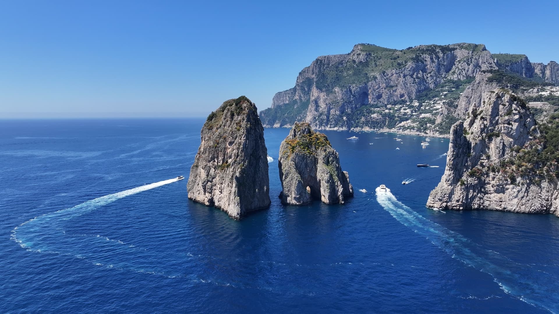 The Faraglioni sea stacks off the coast of Capri from above