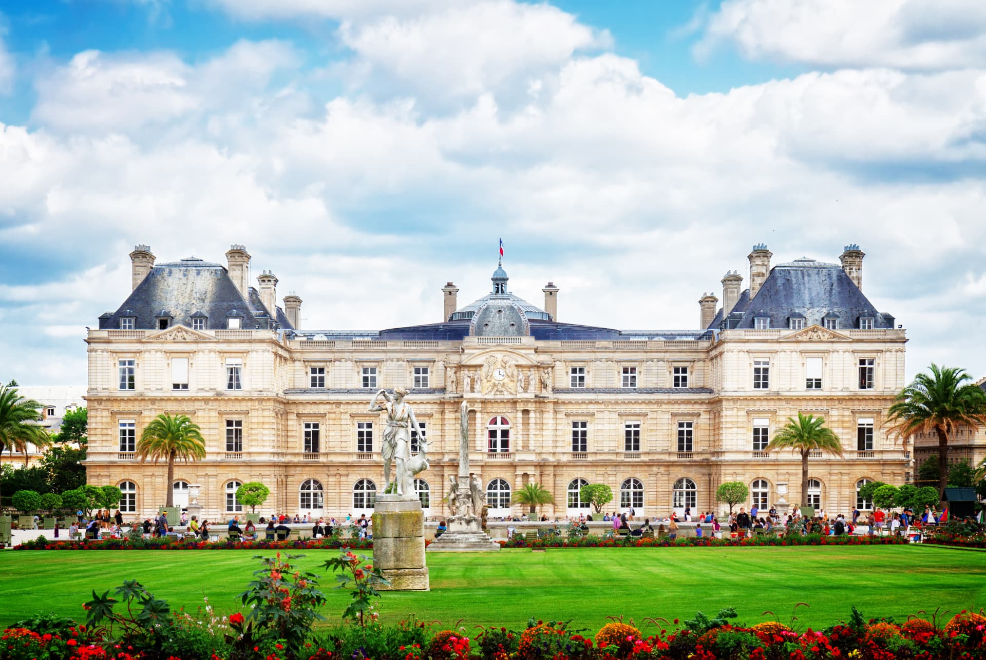 The Luxembourg Palace facade behind its lawns and flowerbeds