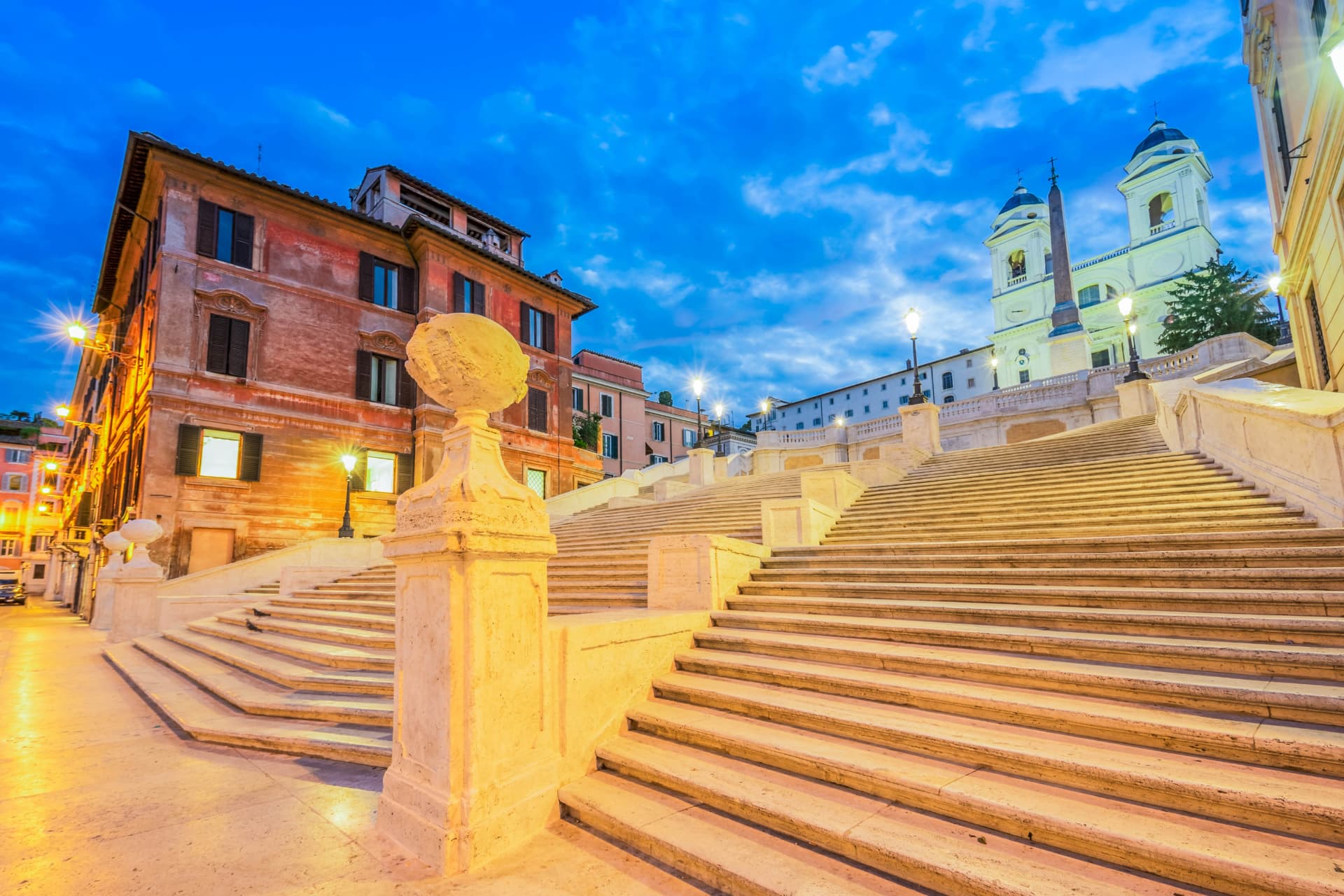 Illuminated stone balustrades on the Spanish Steps at blue hour