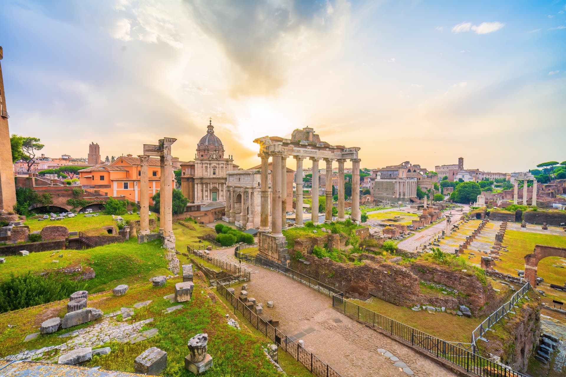 Roman Forum ruins with temple columns and archaeological paths