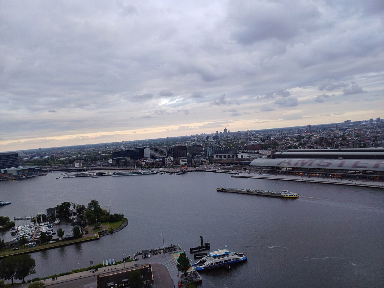 The A'DAM Lookout tower seen across the IJ river in Amsterdam