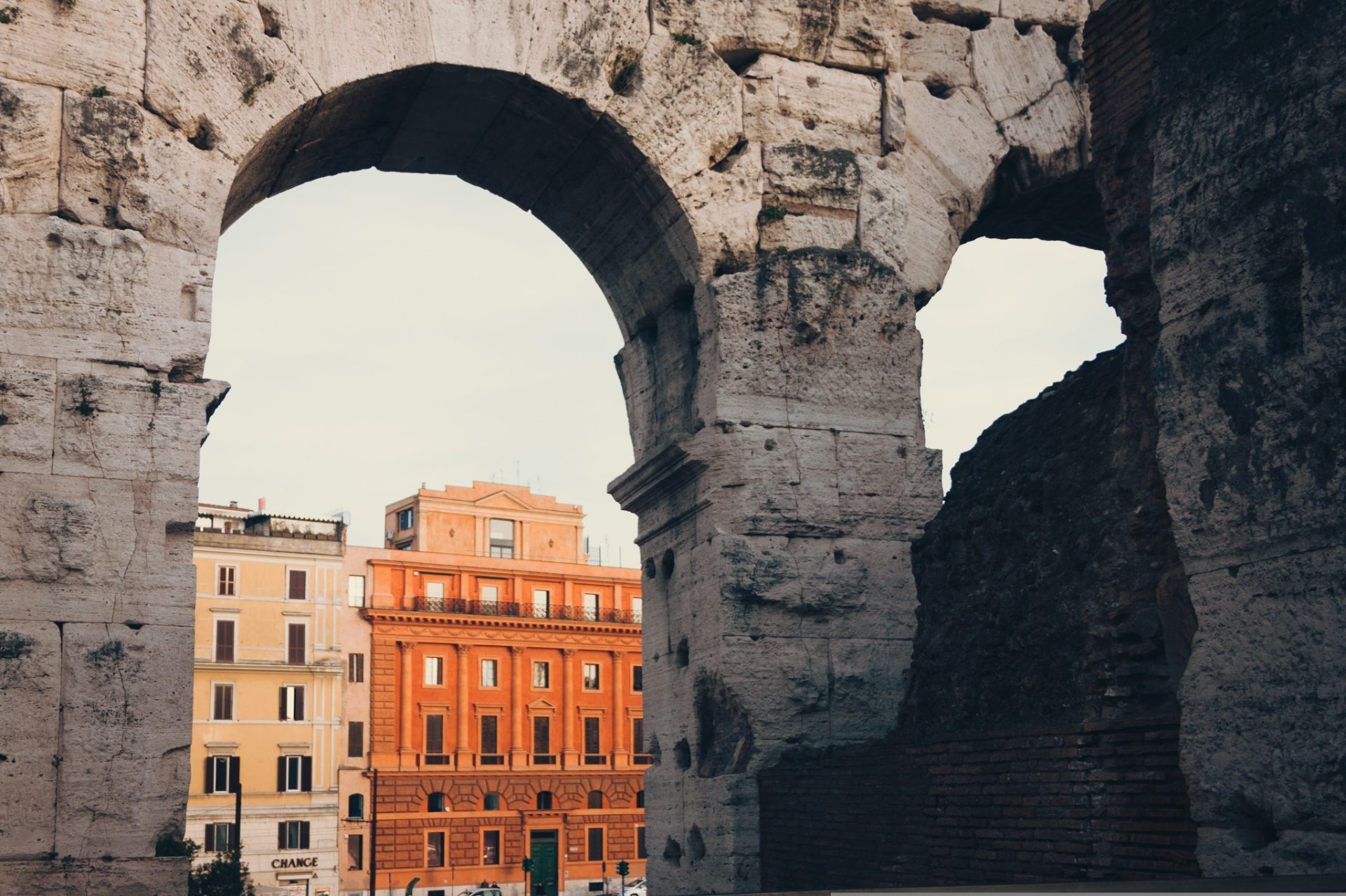 Crowds outside the Colosseum in bright summer sunshine