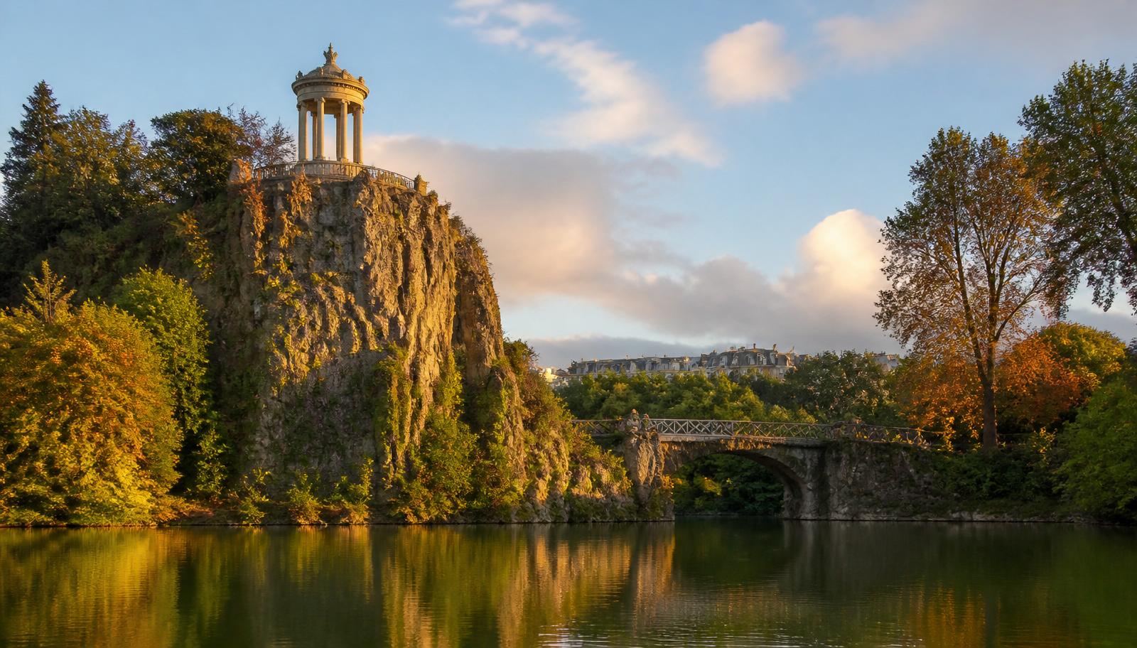 The Temple de la Sibylle perched on a rocky cliff above the lake in Parc des Buttes-Chaumont, one of Paris's best free parks with skyline views