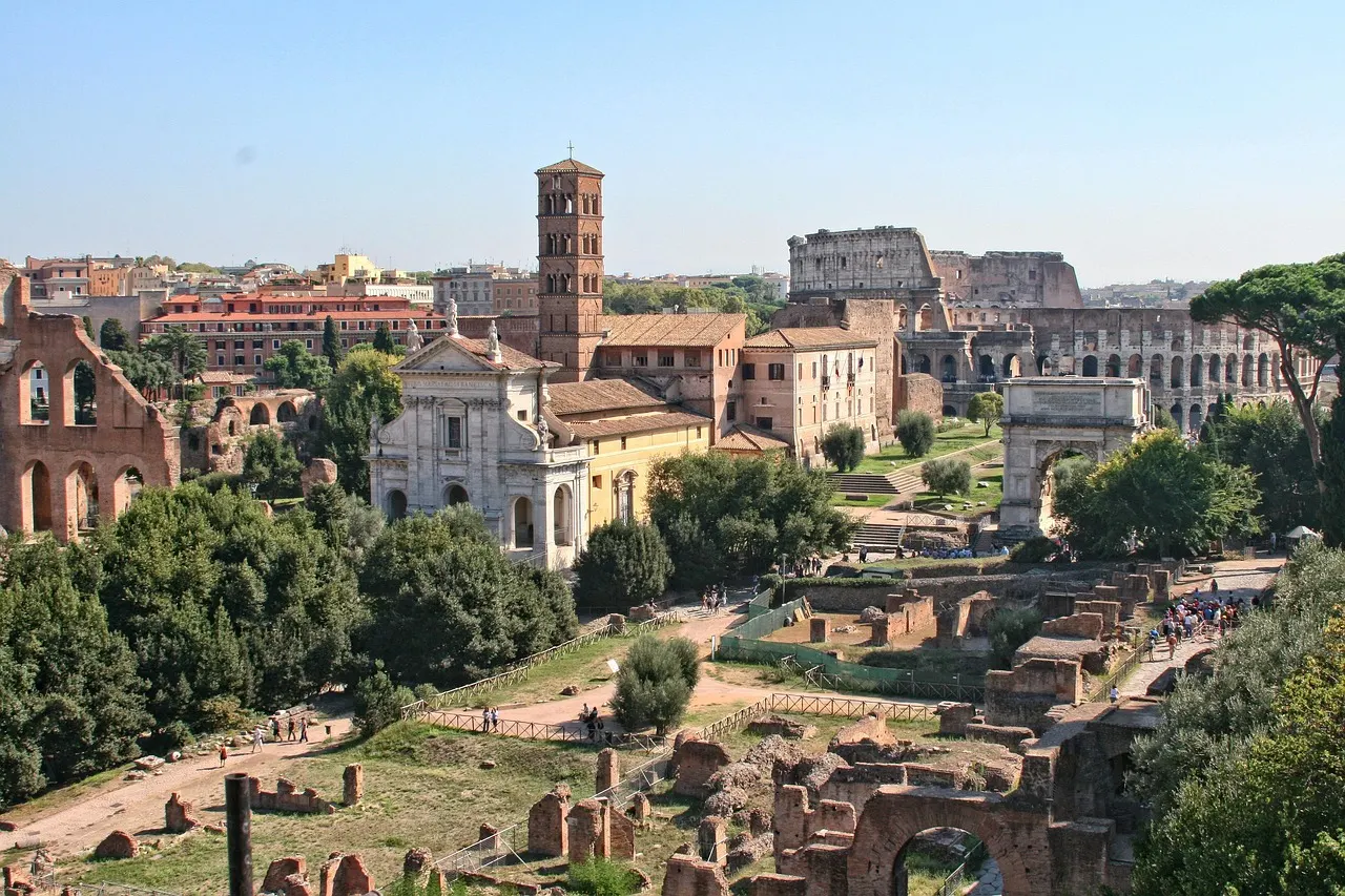 Ruins of temples and columns in the Roman Forum below the Palatine Hill