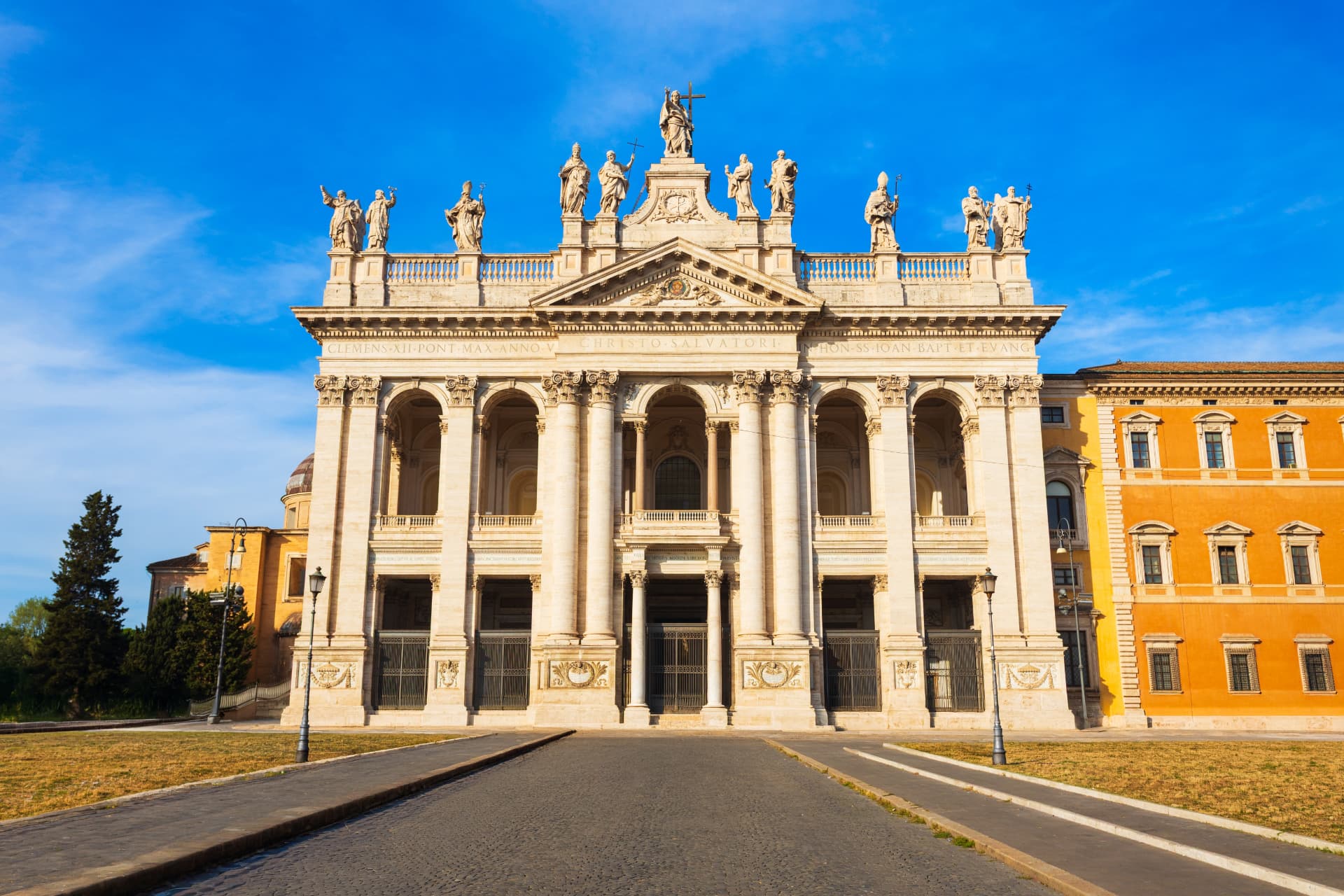 The Neoclassical façade of Basilica di San Giovanni in Laterano by Alessandro Galilei (1735), crowned with statues of Christ and the Apostles